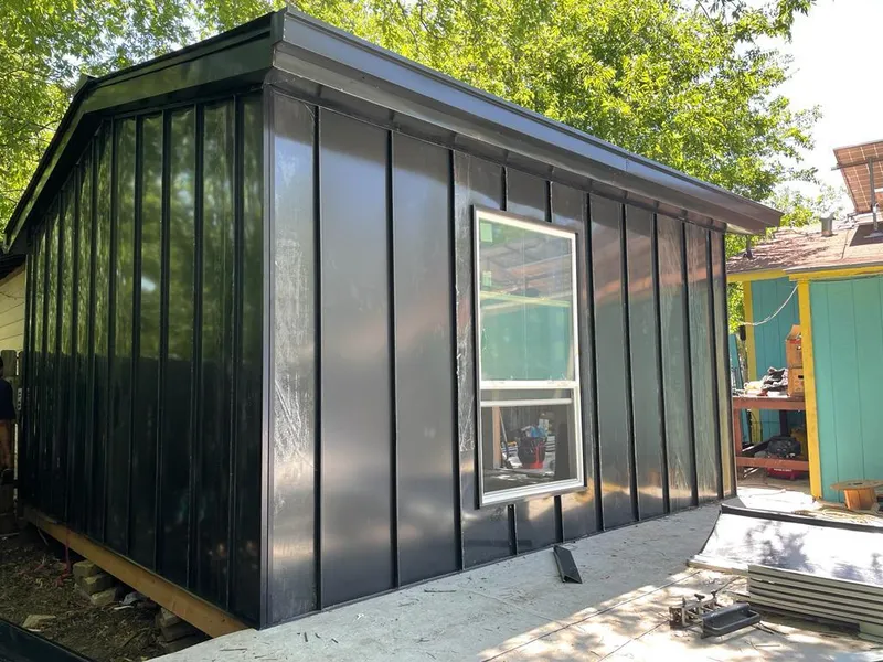 Black standing seam metal wall panels for Roof Inspection in Half Moon Bay