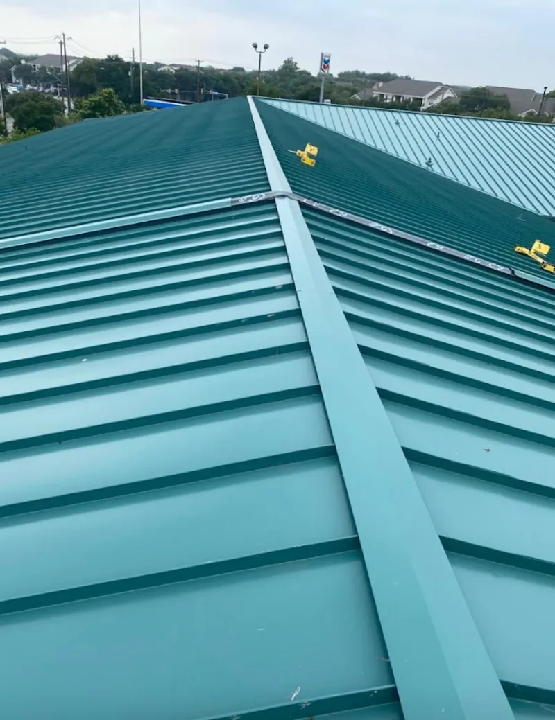 Green commercial metal roof ridge and valley for Metal Roof Repair in Half Moon Bay